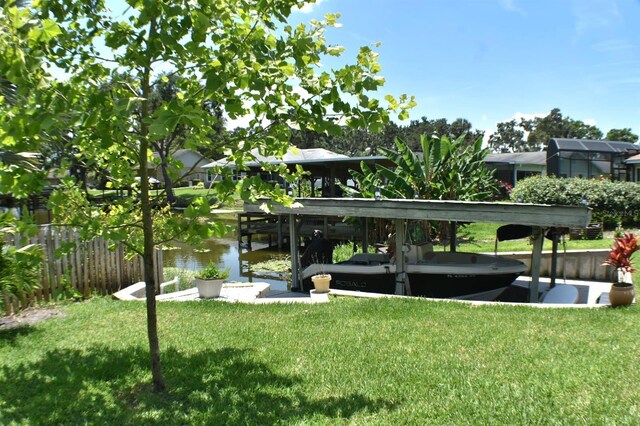 225 Temple Cir, Eustis, FL 32726 - dock featuring a water view and boat lift