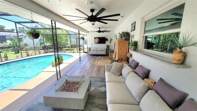 225 Temple Cir, Eustis, FL 32726 - outdoor pool with an outdoor living space, a patio area, ceiling fan, and a lanai