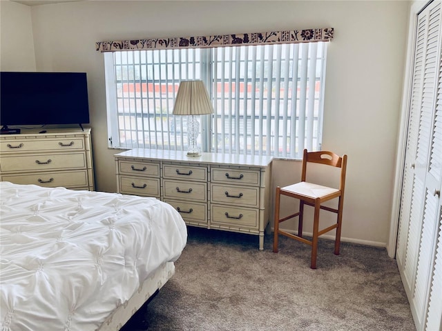 bedroom featuring light carpet