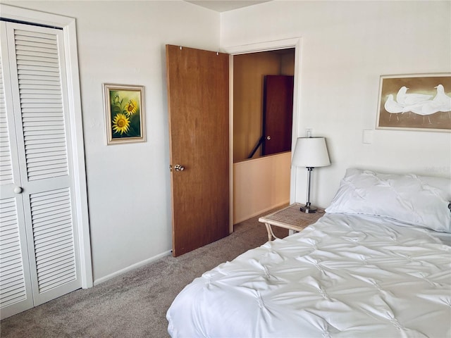 carpeted bedroom featuring a closet