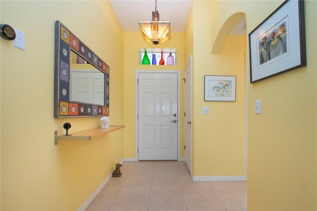 entrance foyer with light tile patterned floors