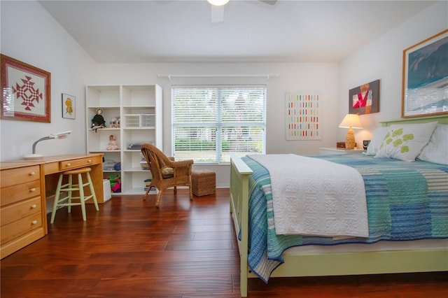 bedroom with ceiling fan and dark wood-type flooring