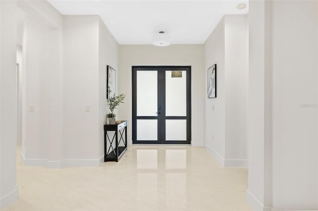 entryway featuring french doors