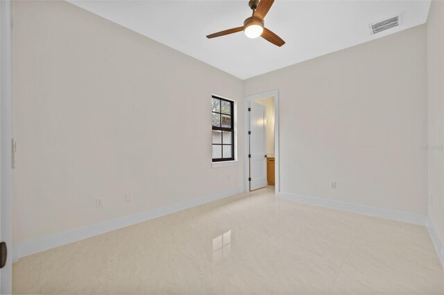 unfurnished room featuring ceiling fan