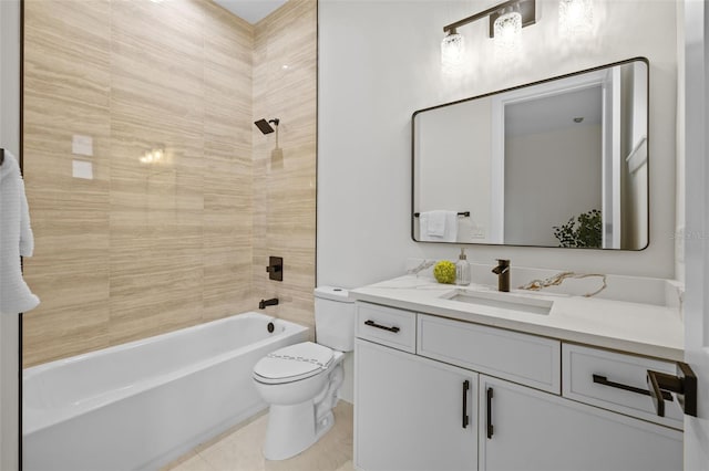 full bathroom with toilet, vanity, tiled shower / bath, and tile patterned flooring