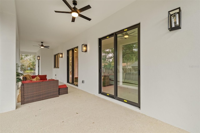 view of patio / terrace featuring an outdoor living space and ceiling fan