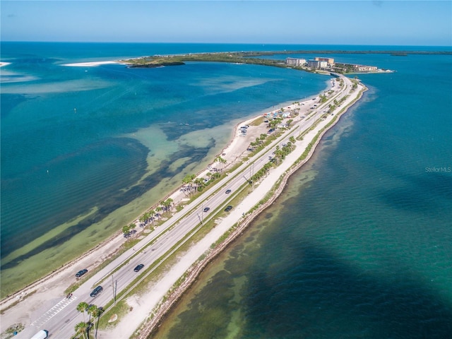 aerial view with a view of the beach and a water view