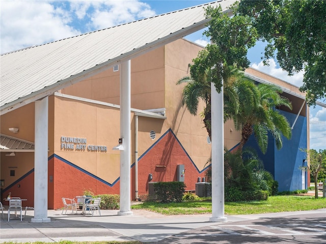 view of building exterior featuring central AC