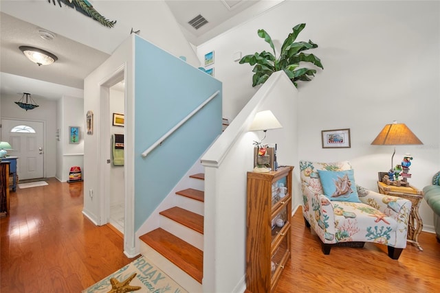 458 Grant St, Dunedin, FL 34698 - stairway with wood finished floors and baseboards