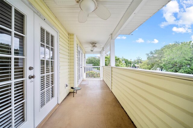 458 Grant St, Dunedin, FL 34698 - balcony featuring french doors and a ceiling fan