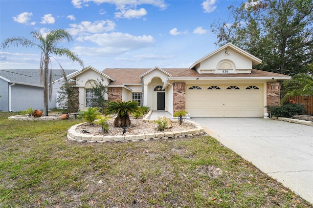 ranch-style house with a front yard and a garage