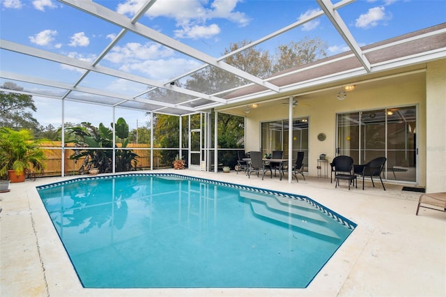 view of pool featuring a patio area and a lanai