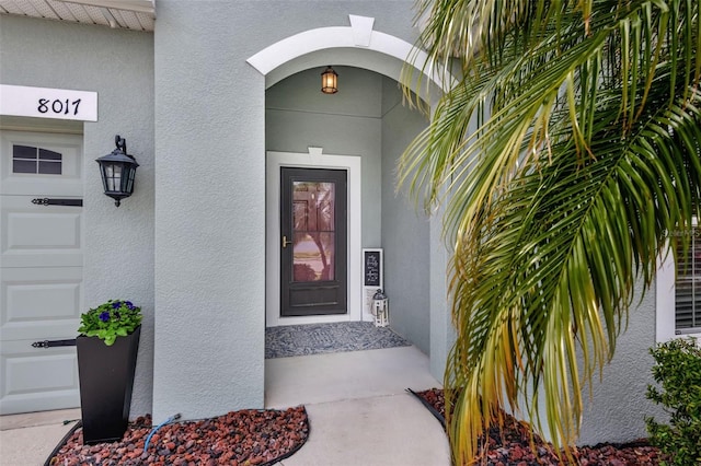 entrance to property with a garage