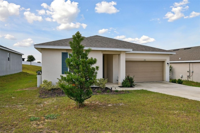 view of front facade with a front yard and a garage