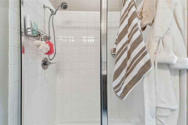 bathroom with tiled shower