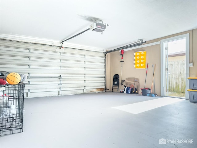 garage featuring a garage door opener