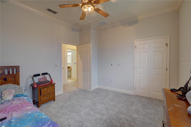 bedroom with ceiling fan, light carpet, crown molding, and a closet