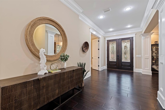 310 8th Ave N, Saint Petersburg, FL 33701 - foyer featuring french doors, baseboards, ornamental molding, ornate columns, and dark wood-style floors