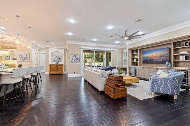 310 8th Ave N, Saint Petersburg, FL 33701 - living area featuring crown molding, ceiling fan, dark wood-style floors, recessed lighting, and baseboards