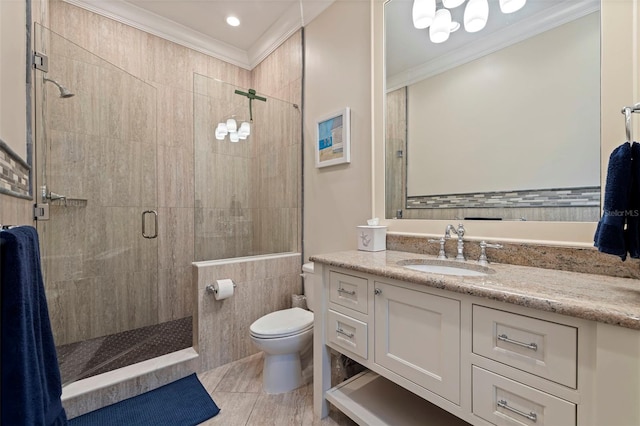 310 8th Ave N, Saint Petersburg, FL 33701 - full bathroom featuring ornamental molding, a stall shower, toilet, and vanity
