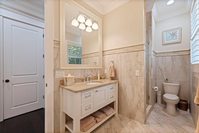 310 8th Ave N, Saint Petersburg, FL 33701 - full bathroom featuring toilet, tile walls, a wainscoted wall, crown molding, and vanity