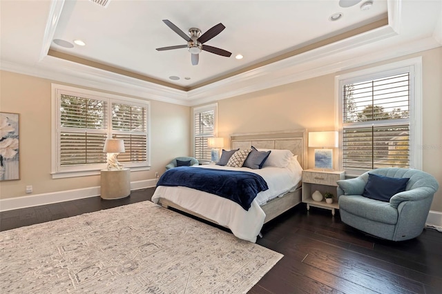 310 8th Ave N, Saint Petersburg, FL 33701 - bedroom featuring a raised ceiling, ornamental molding, dark wood finished floors, baseboards, and ceiling fan