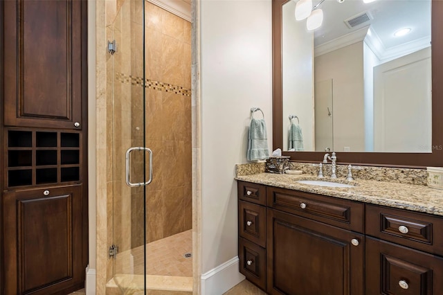 310 8th Ave N, Saint Petersburg, FL 33701 - bathroom with ornamental molding, a shower stall, and vanity