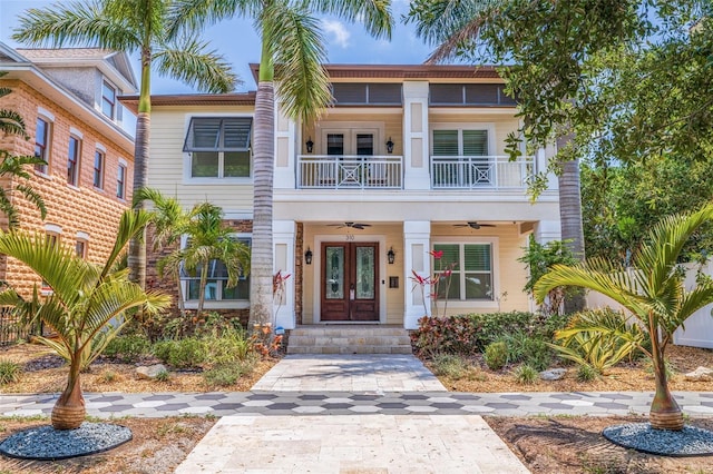 310 8th Ave N, Saint Petersburg, FL 33701 - townhome / multi-family property featuring french doors, a balcony, and ceiling fan