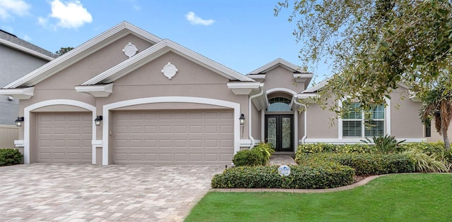 view of front of property with a garage