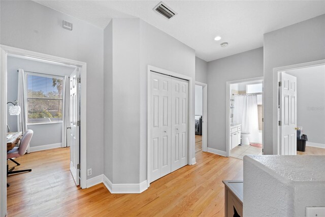 hall featuring light hardwood / wood-style flooring