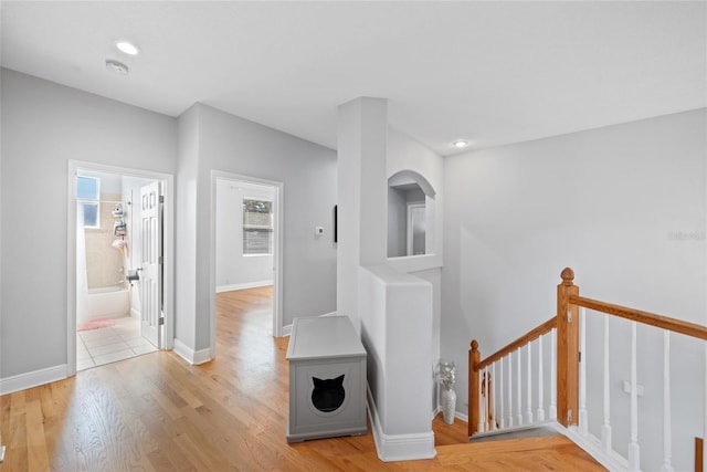 hallway with light wood-type flooring