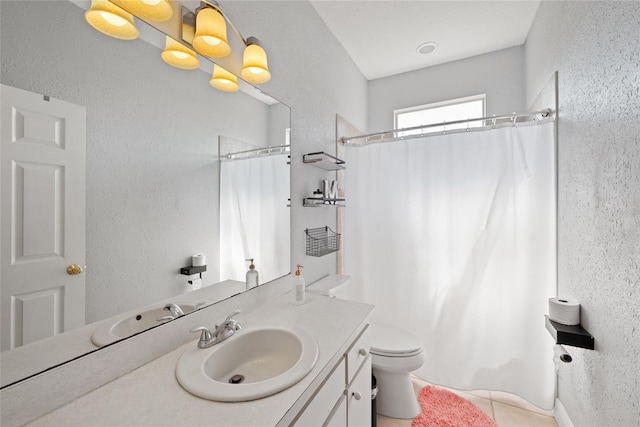 bathroom featuring tile patterned floors, vanity, toilet, and a shower with shower curtain