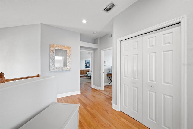 hall featuring light hardwood / wood-style flooring