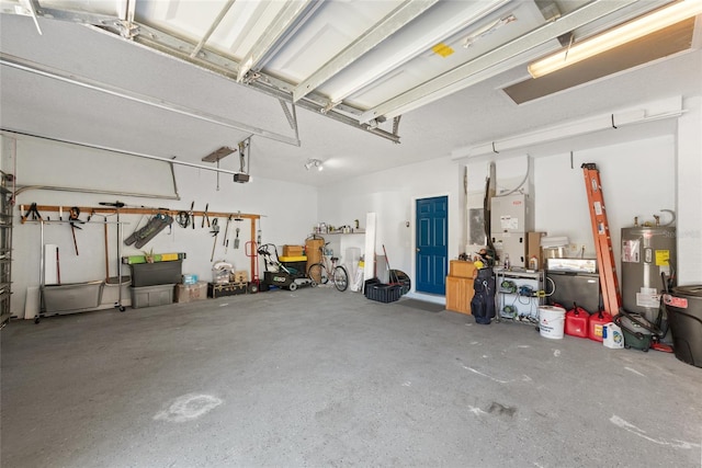 garage with water heater and a garage door opener