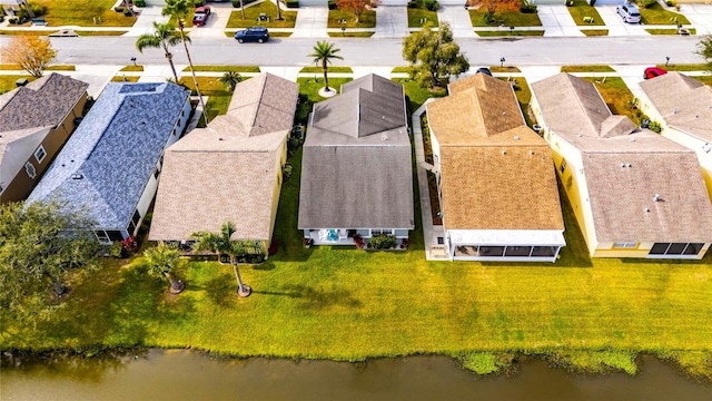 bird's eye view with a water view