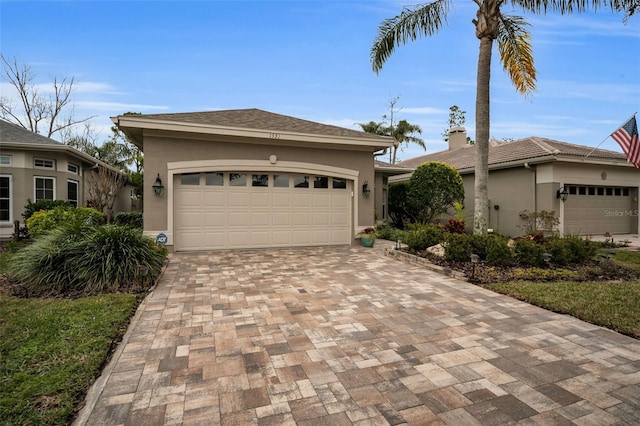 view of front of property with a garage