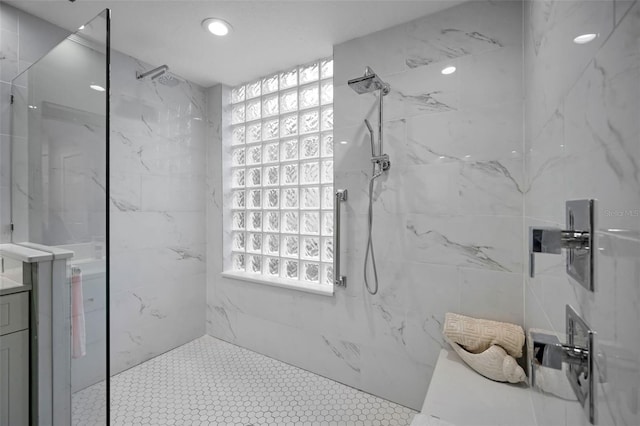 bathroom with tiled shower