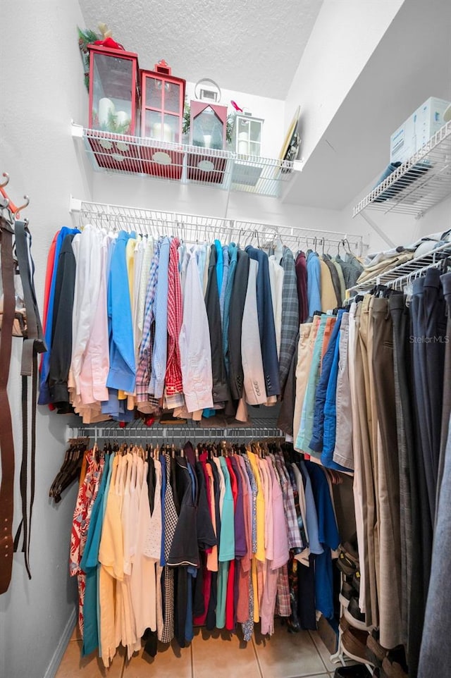 walk in closet featuring tile patterned floors