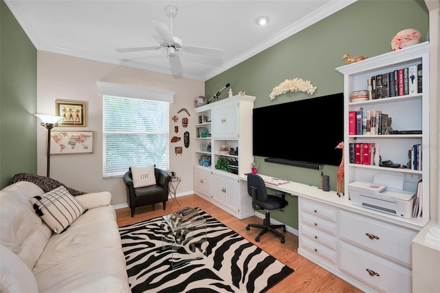 office area featuring light hardwood / wood-style floors, crown molding, and ceiling fan