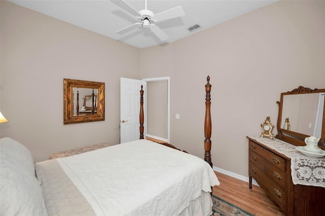 bedroom featuring ceiling fan and light hardwood / wood-style floors