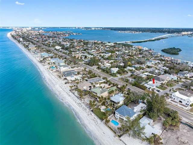 aerial view featuring a water view and a view of the beach