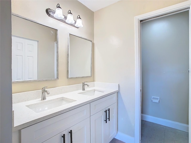 bathroom featuring tile patterned floors and vanity