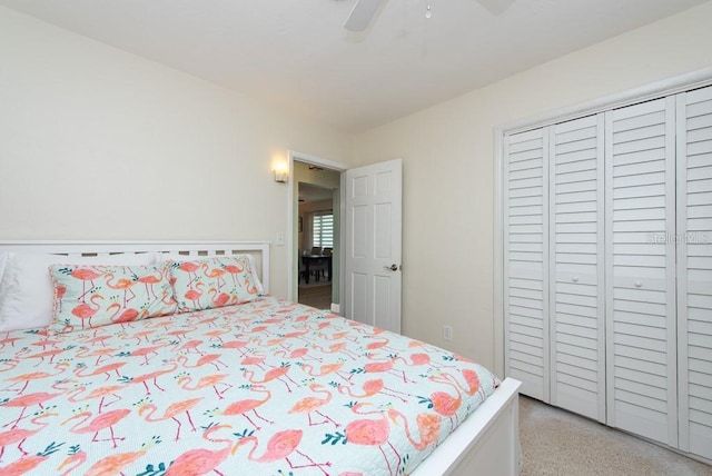 bedroom featuring ceiling fan and a closet