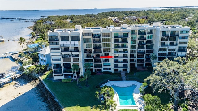 birds eye view of property with a water view