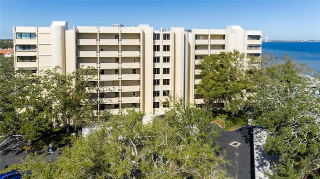 view of building exterior with a water view