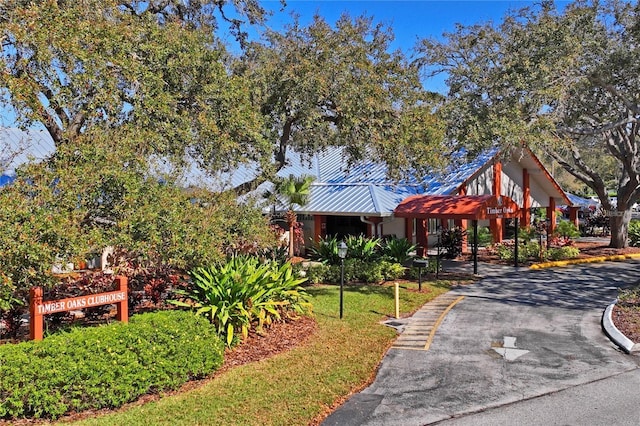 view of community featuring a lawn