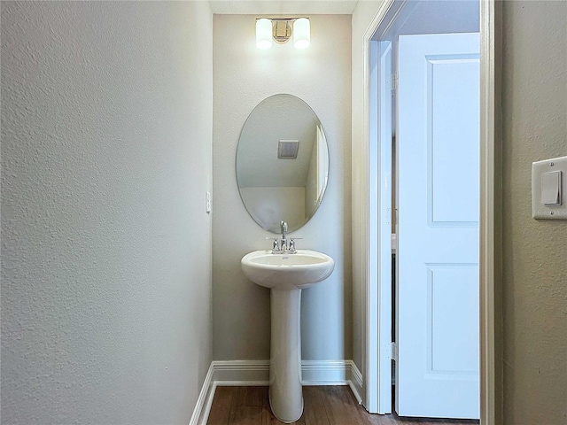 bathroom featuring hardwood / wood-style floors