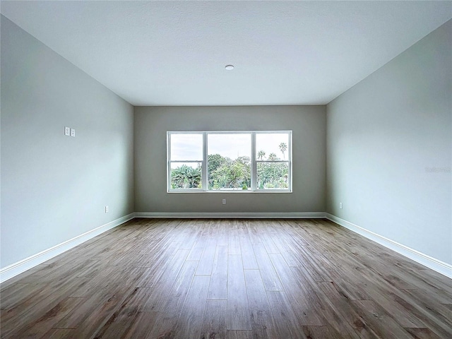 empty room featuring hardwood / wood-style floors