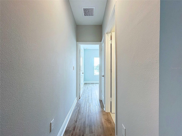 hall featuring light wood-type flooring