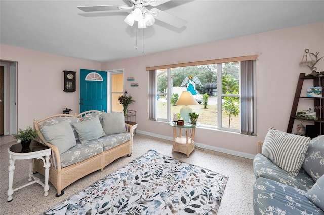 living room featuring ceiling fan